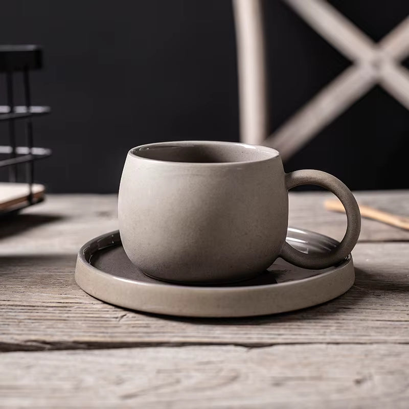 Ceramic clay mugs with saucers