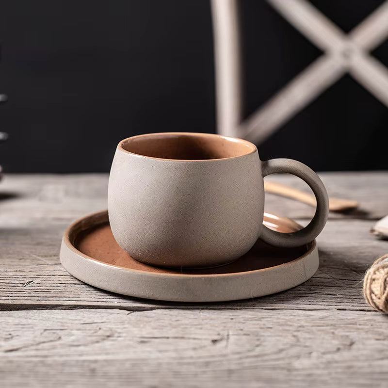 Ceramic clay mugs with saucers