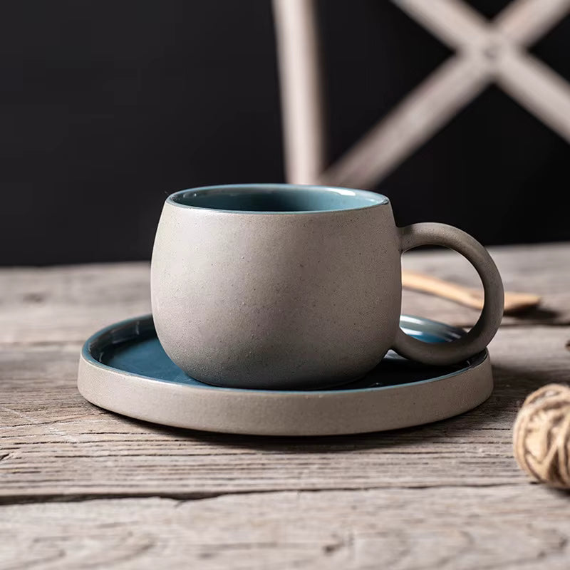 Ceramic clay mugs with saucers