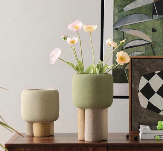 Sculptural Pedestal Vases & Planters