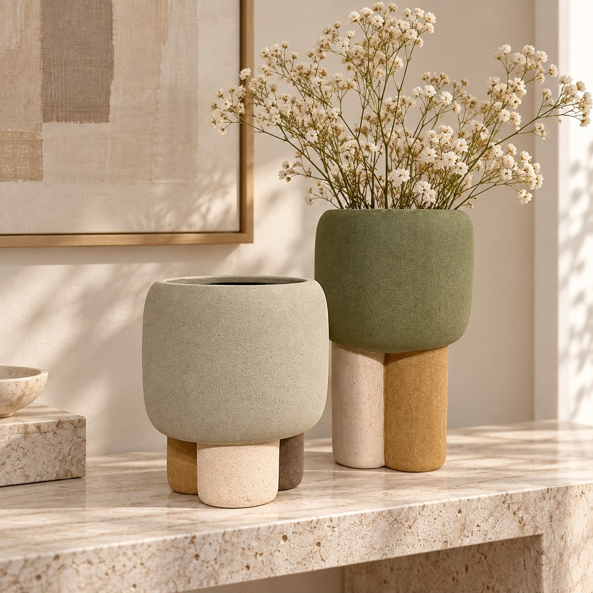 Sculptural Pedestal Vases & Planters